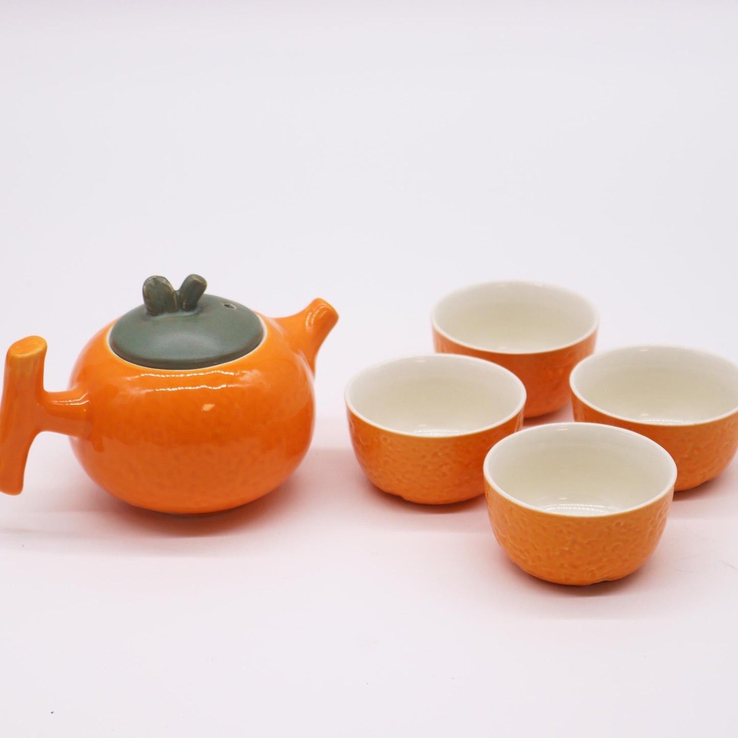 200ml Orange Glazed Ceramic Teapot and 4 Matching Cup Set with no Background
