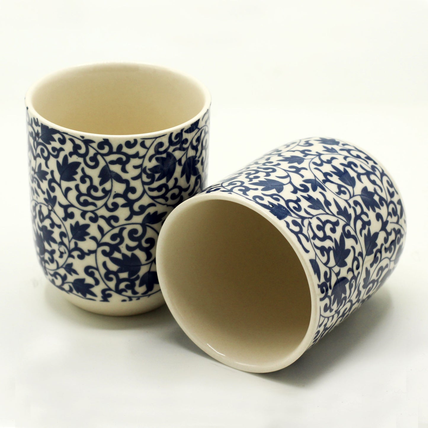 2 Ceramic Blue Patterned Design Herbal Tea Cups with One Lying Down