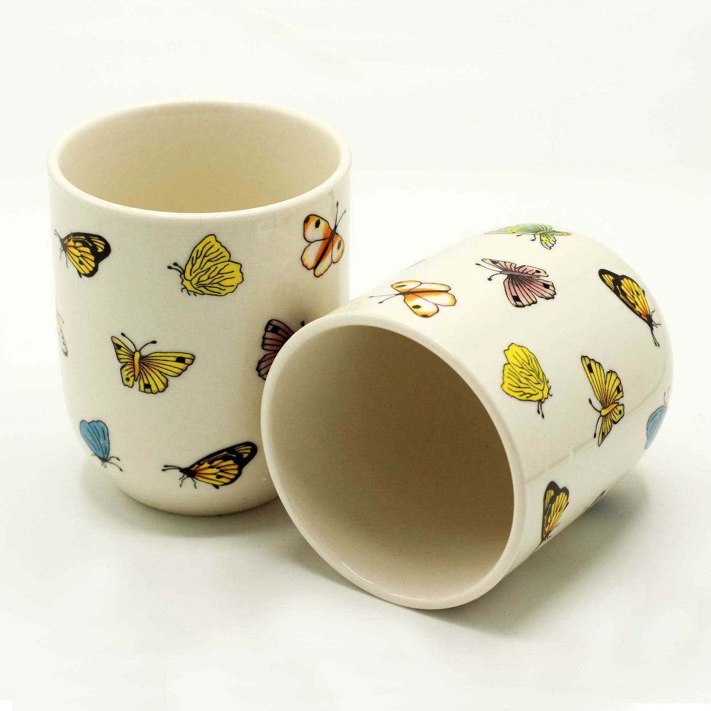 2 Ceramic Butterfly Design Herbal Tea Cups with One Lying Down