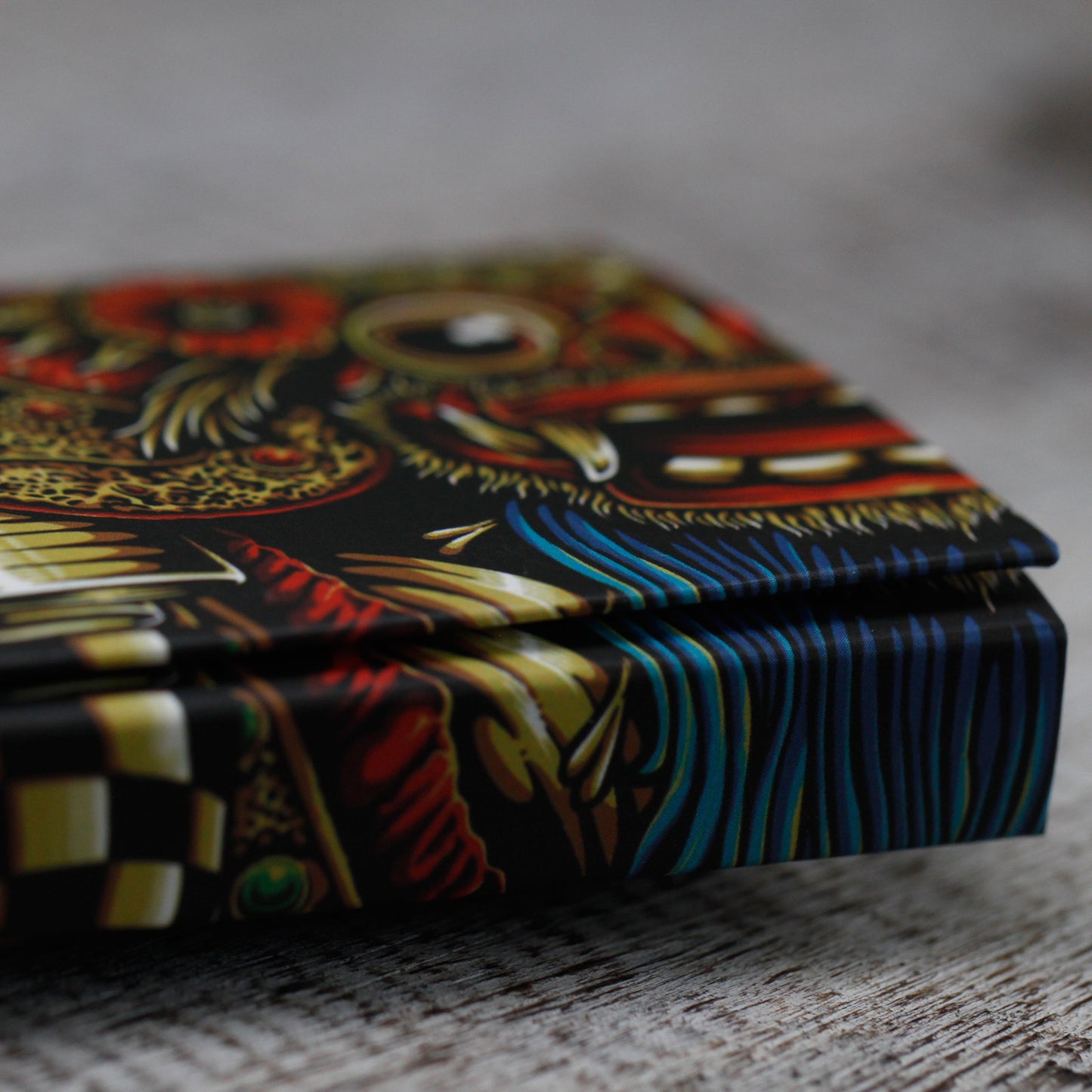 A colourful and artistic jewellery style gift box with vibrant patterns, designed for storing the handmade Mandala earrings