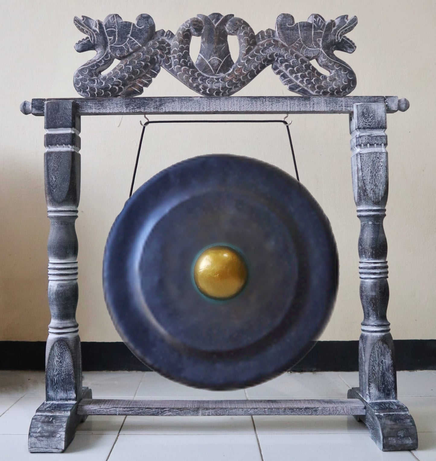 Extra Large 80cm Black Gong - Traditional gong with golden centre, suspended from an ornate wooden frame with carved dragon motifs.