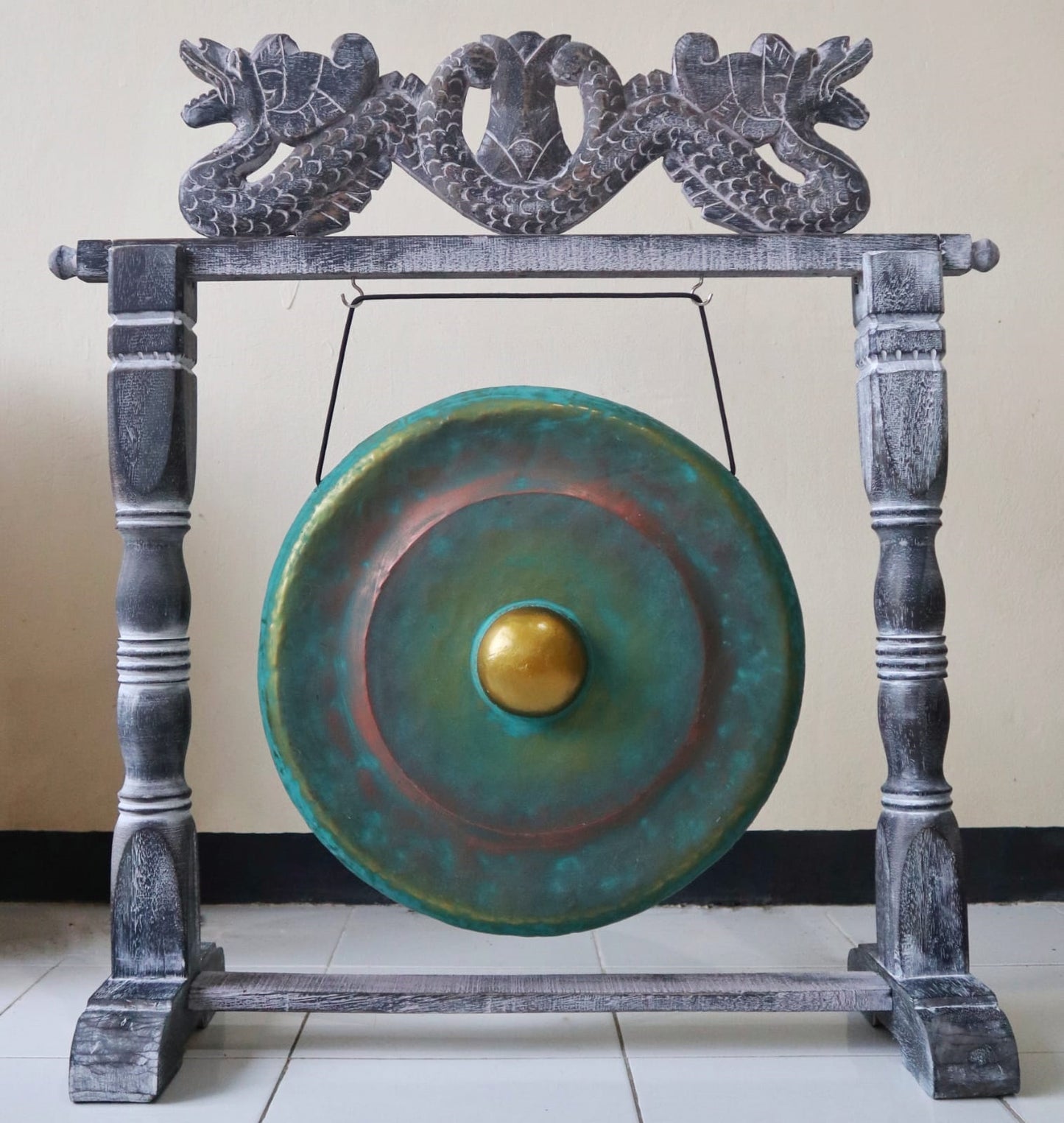 Small 25cm Greenwash Gong - Traditional gong with golden centre, suspended from an ornate wooden frame with carved dragon motifs.