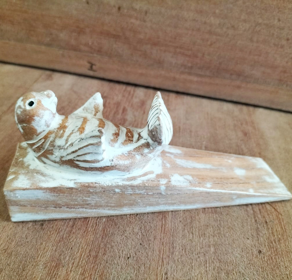 Hand-Carved Eco-Friendly Wooden Animal Doorstop - Baby Seal product packaging on clean background from Quintessential Holistic Health Ltd