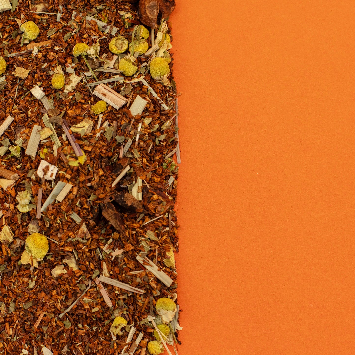 Organic Biodigest Rooibos Blend Artisan Tea - Tinned - 50 g, close-up of loose tea with yellow petals and pale stems, by Quintessential Holistic Health Ltd