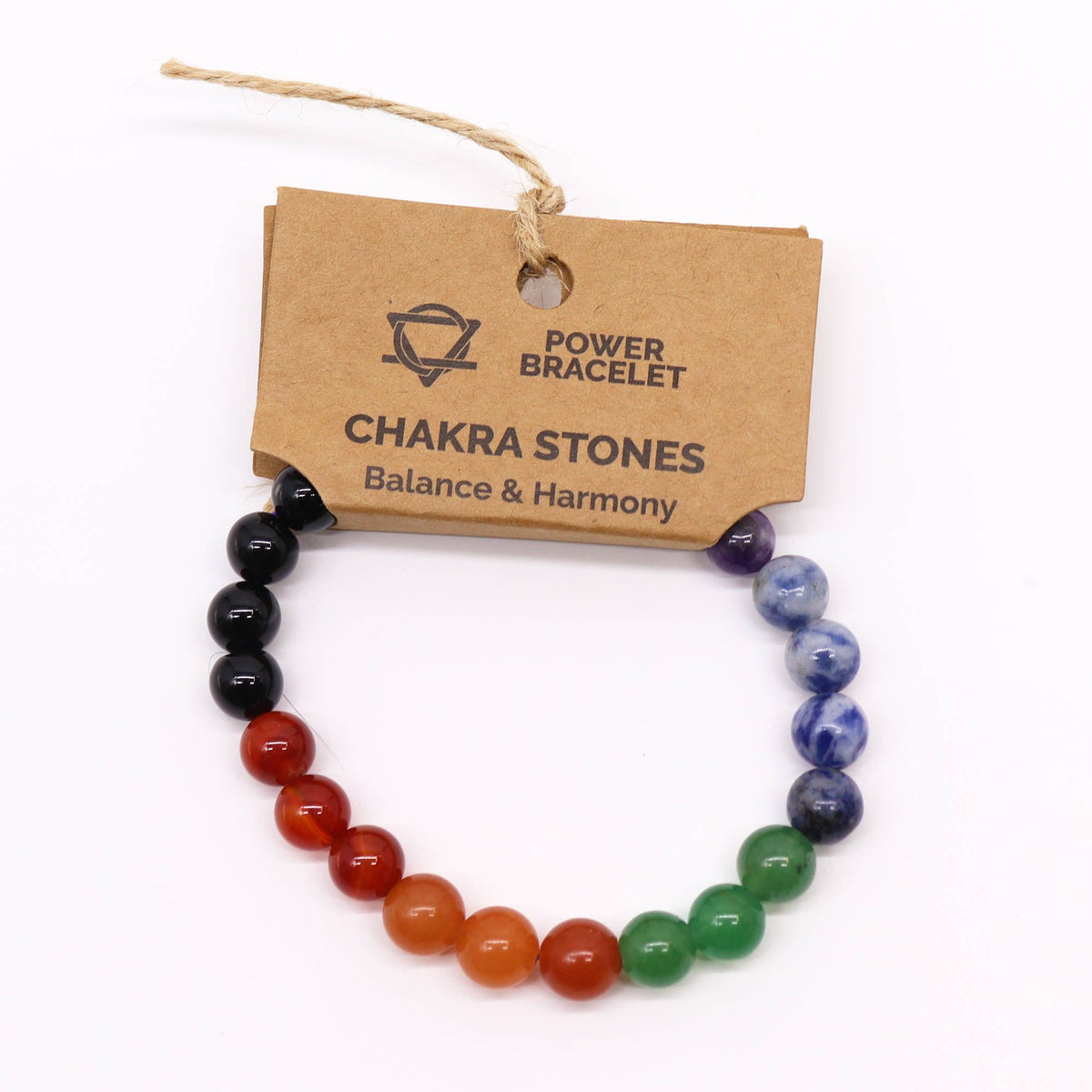 Chakra Stones Gemstone Power Bracelet with multicoloured round beads arranged in grouped colour sections beneath a branded card, by Quintessential Holistic Health Ltd