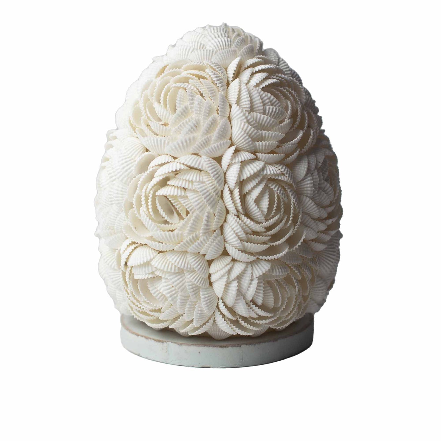 Handcrafted LED Boho Seashell Lamp - Small - Rose - Oval with raised cream shell rosettes and a pale circular base by Quintessential Holistic Health Ltd