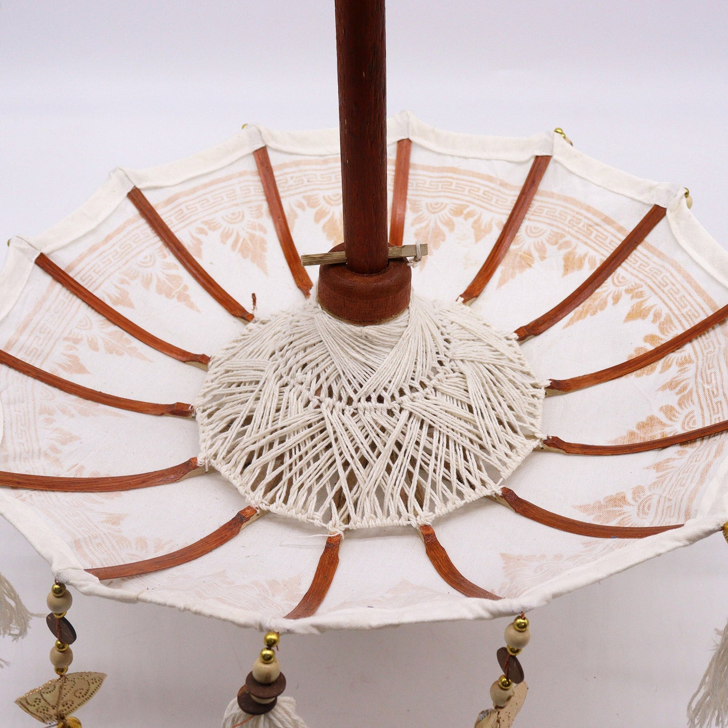 Handcrafted Indoor Parasol with Stand - Small - Plain - Natural, close-up underneath the open canopy with ribs and woven centre, by Quintessential Holistic Health Ltd