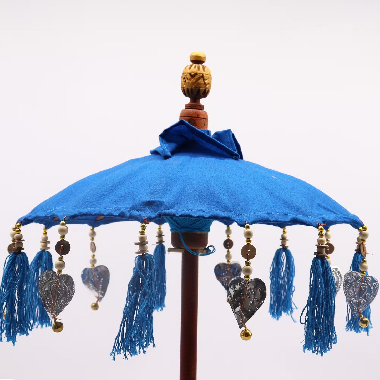 Handcrafted Indoor Parasol with Stand - Small - Blue, close-up of the canopy edge with blue tassels and heart ornaments, by Quintessential Holistic Health Ltd
