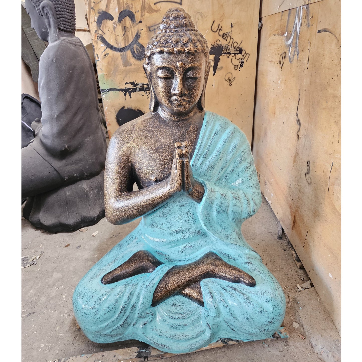 Handmade Concrete and Resin Praying Buddha Statue - Medium / 1.2m Tall / Turquoise and Gold product packaging on clean background from Quintessential Holistic Health Ltd