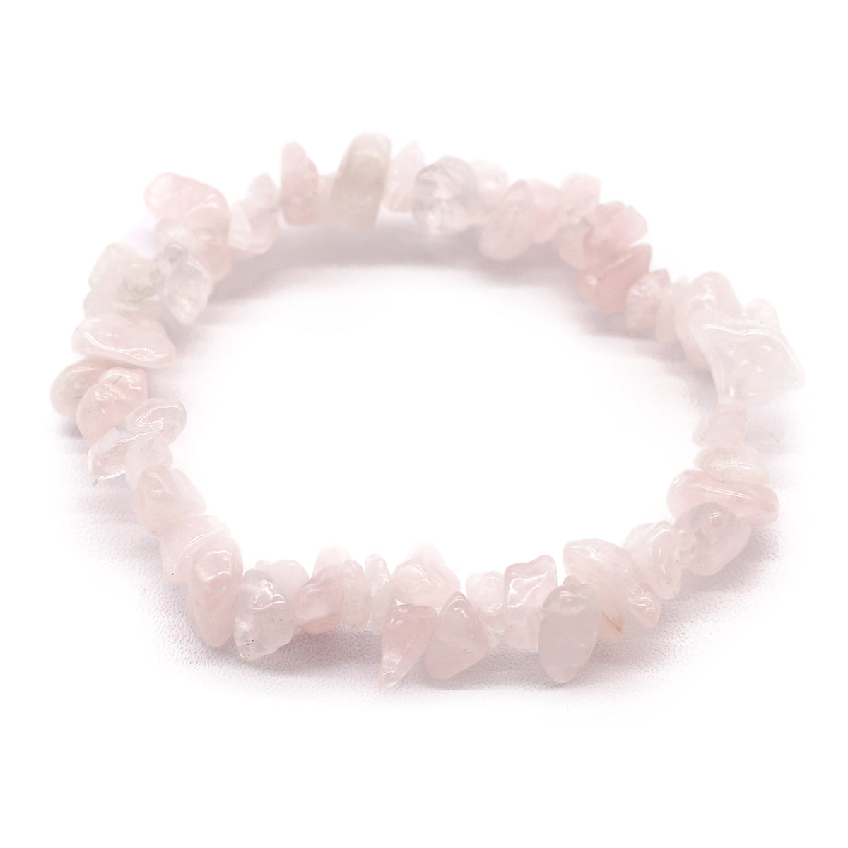 Rose Quartz bracelet bath bomb, circular bracelet of translucent pale pink stone chips from Quintessential Holistic Health.