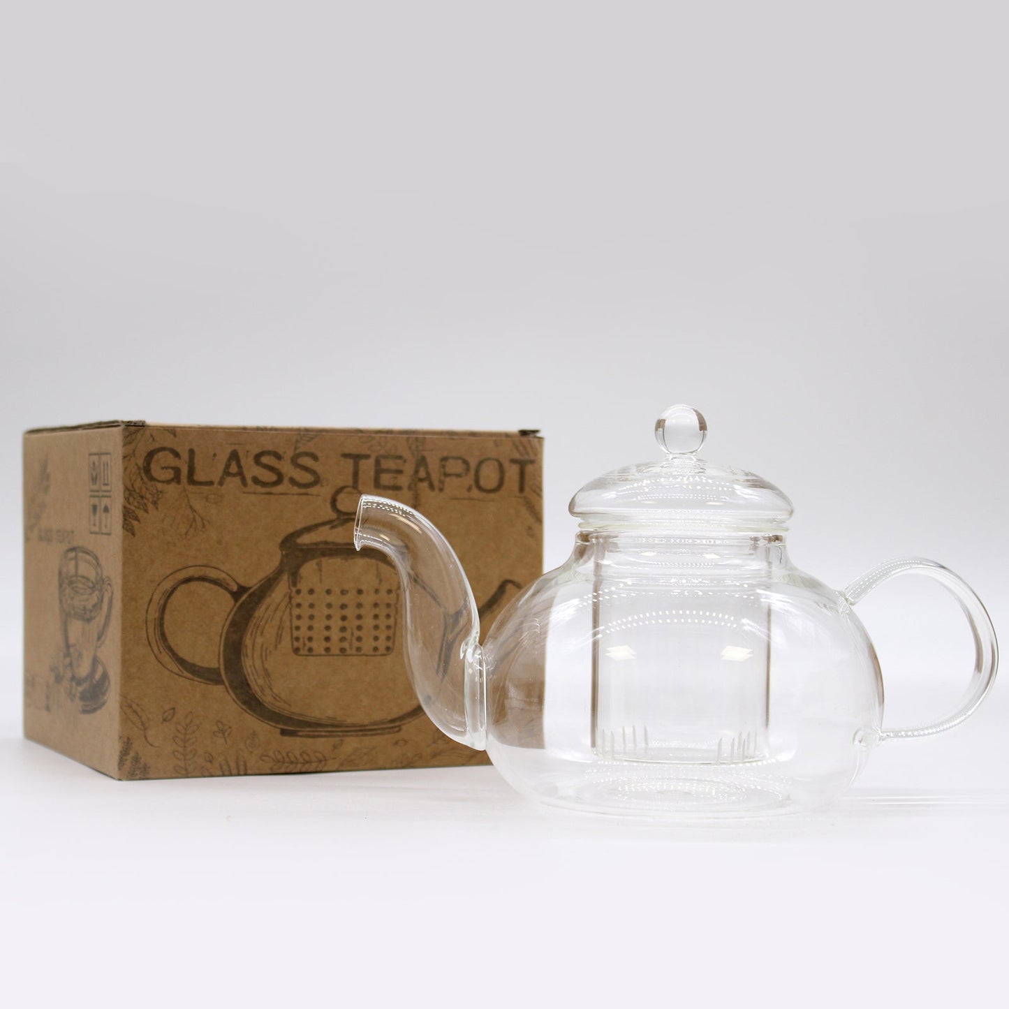 Round Pearl Glass Infuser Teapot - 800ml, clear rounded teapot with infuser and lid beside a printed carton by Quintessential Holistic Health Ltd