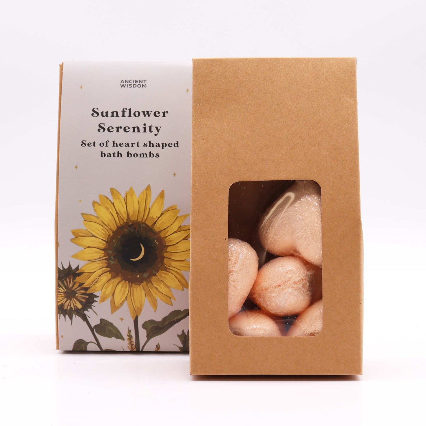 Sunflower Serenity Heart Bath Bombs - Passion, showing pale peach hearts visible through a kraft box window from Quintessential Holistic Health.