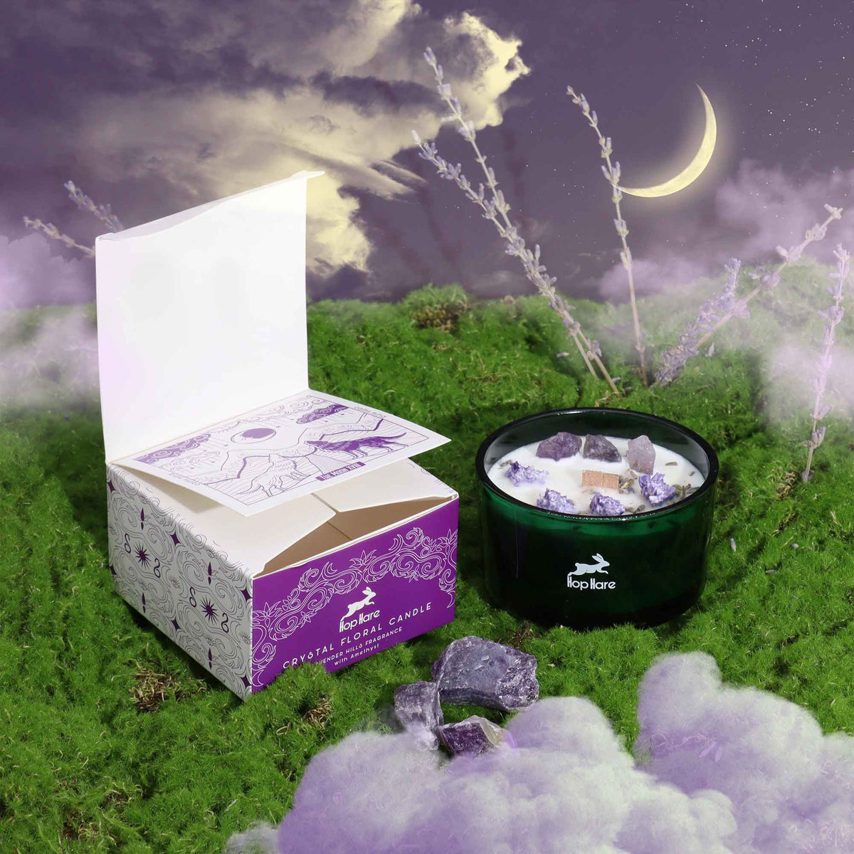 Eco-Friendly Soy Wax Candle - The Moon beside an open purple box on moss beneath a crescent moon by Quintessential Holistic Health Ltd