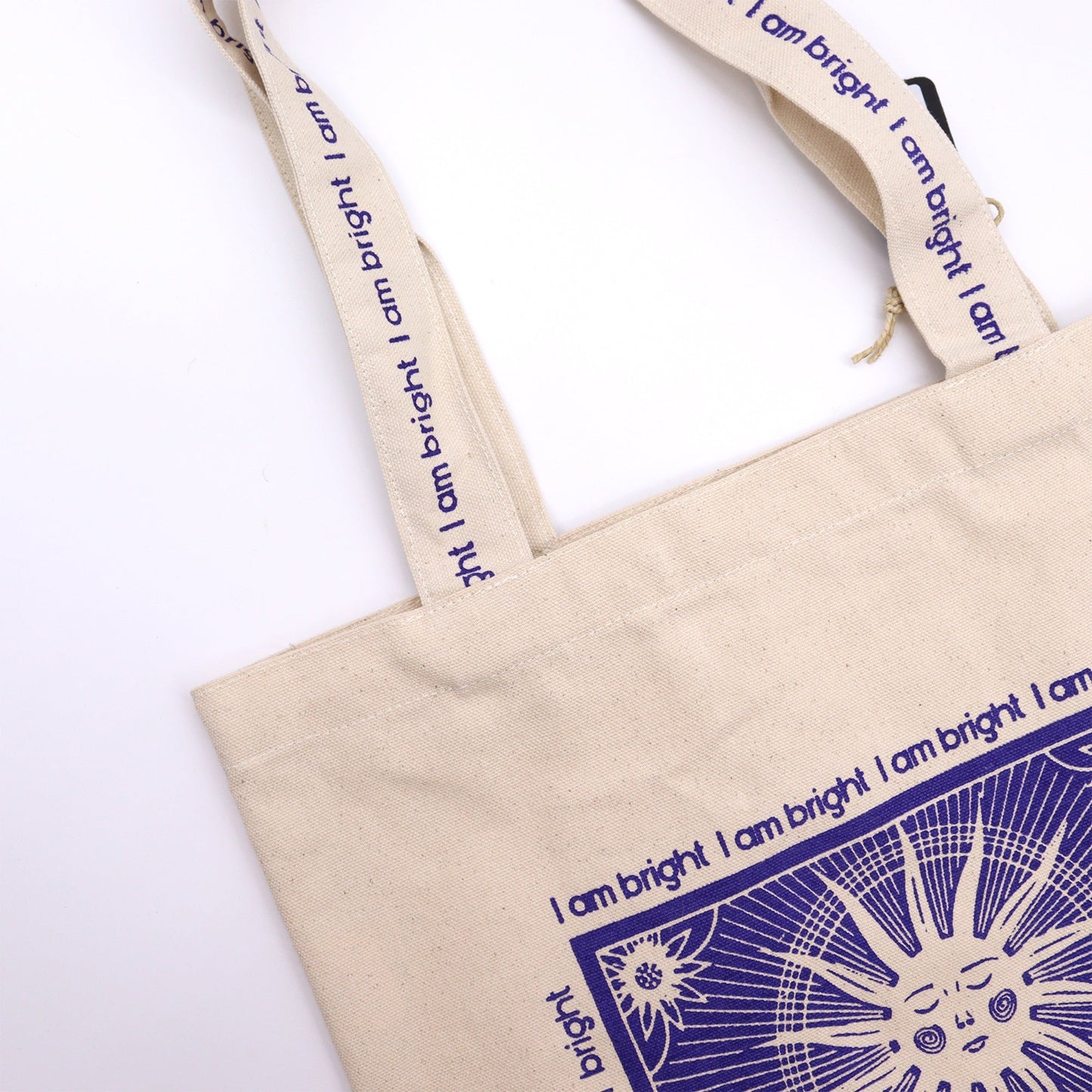 Sun Tarot Card Eco-Friendly Cotton Canvas Tote Bag - I Am Bright product packaging on clean background from Quintessential Holistic Health Ltd