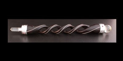 Handmade Spiral Teak Wood Wand - Rock Quartz Gemstone, a slender twisted wand with pale pointed ends displayed on black by Quintessential Holistic Health Ltd