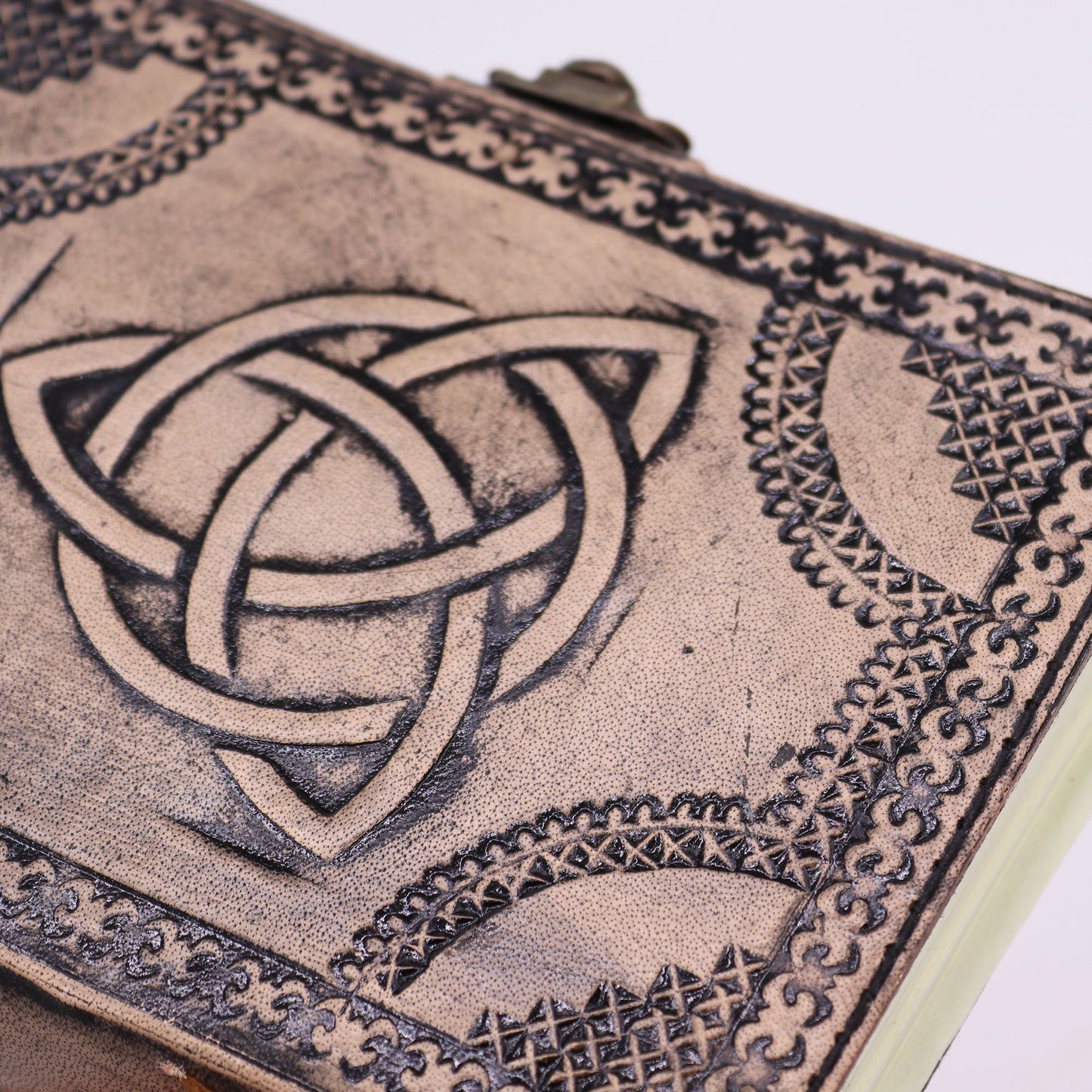 Medium Leather-Bound Notebook - Grey/Tan Circle Triquetra, with an embossed triquetra and patterned corner border by Quintessential Holistic Health Ltd