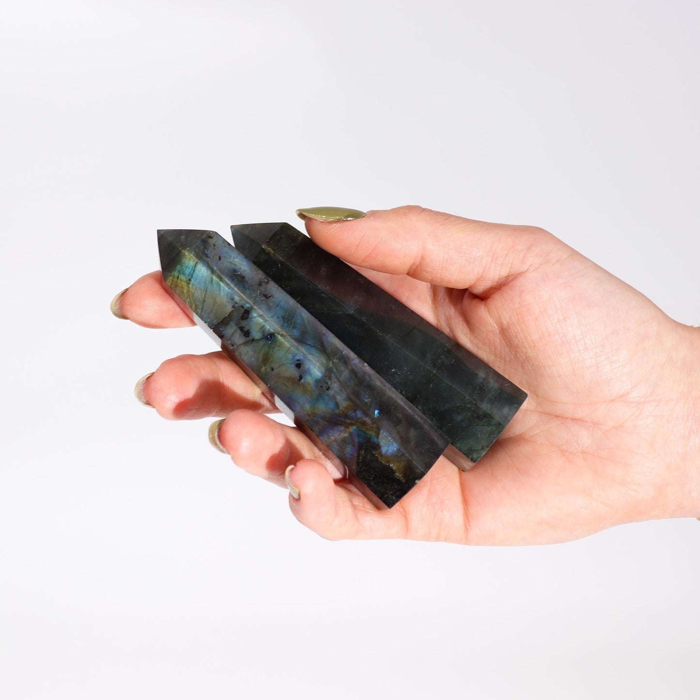 Natural Labradorite Point product packaging on clean background from Quintessential Holistic Health Ltd