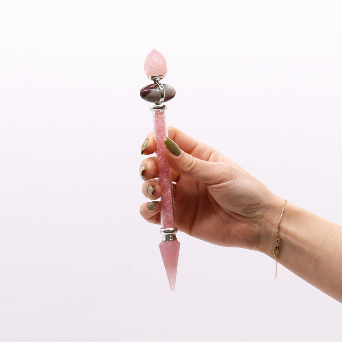 Shiva Lingam Wand - Rose Quartz Gemstones - Love, 19.5 × 3 cm, pink crystal wand held upright in one hand, by Quintessential Holistic Health Ltd
