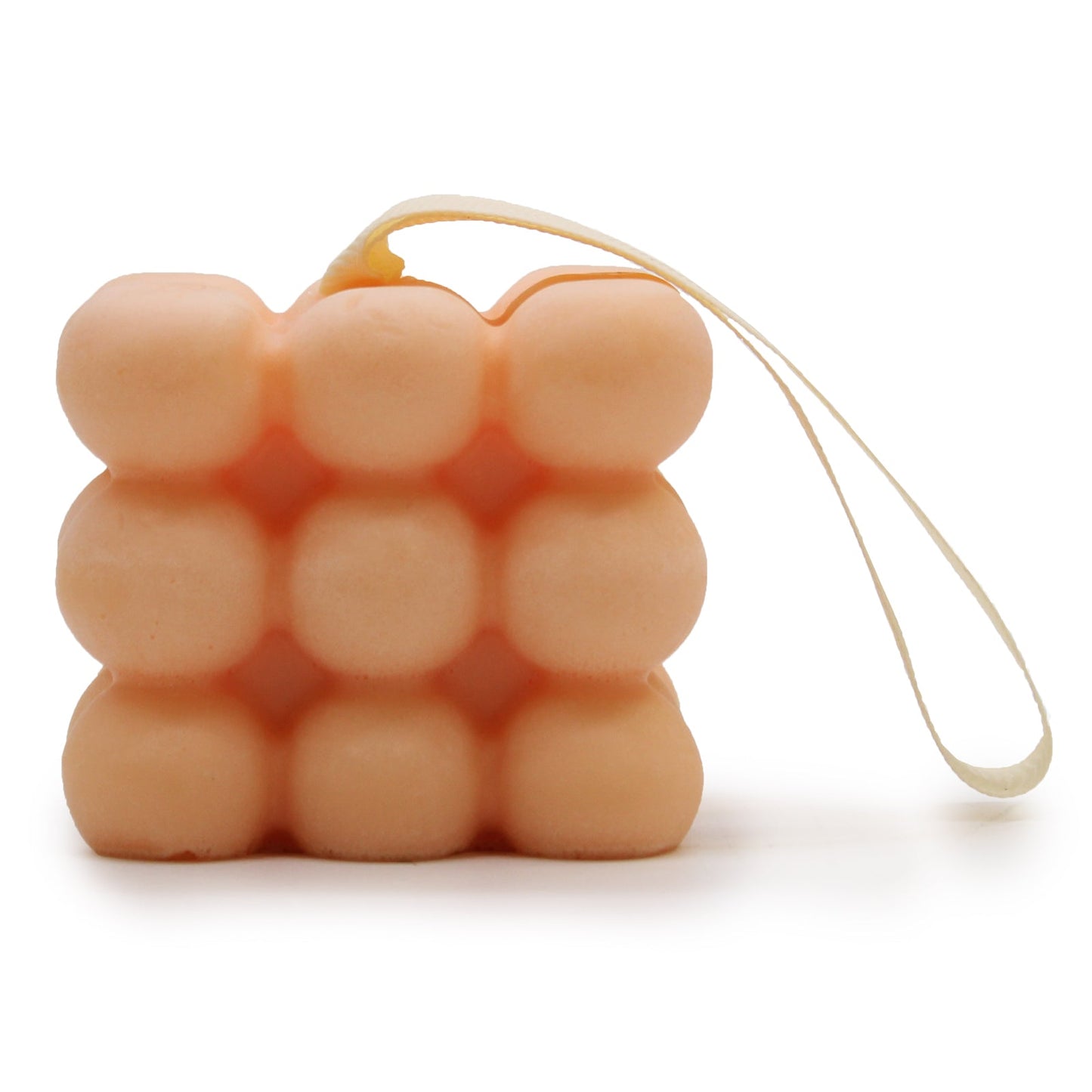 Massage Soap Bar - Geranium and Sandalwood, with a peach bubble design and cream hanging loop by Quintessential Holistic Health Ltd