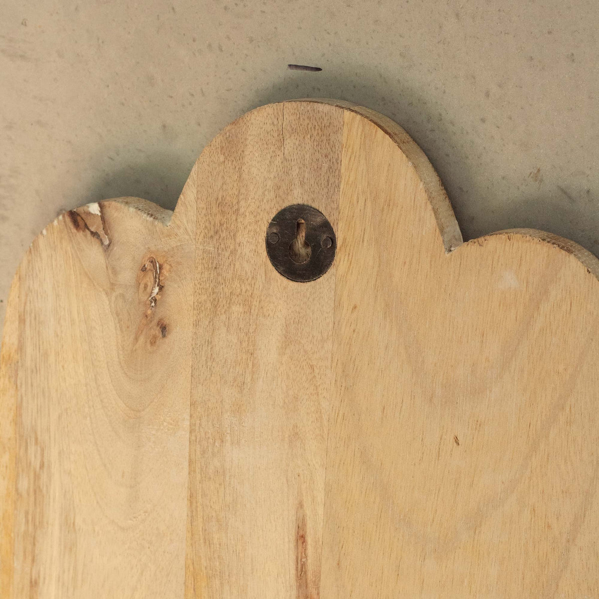 Hand-Carved Mango Wood Hamsa Wall Plaque - Whitewash showing the plain wood back, scalloped top and dark hanging fitting by Quintessential Holistic Health Ltd