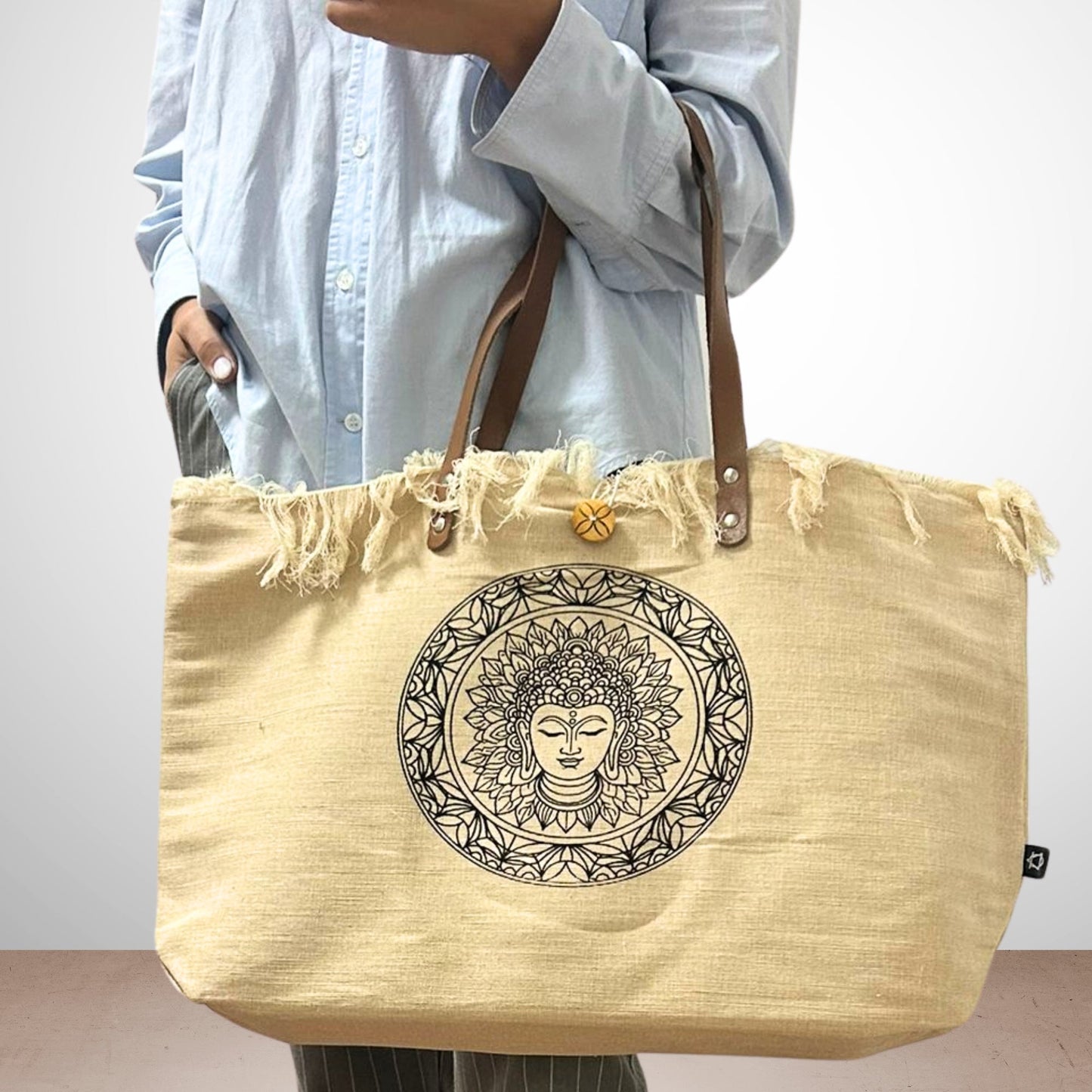 Handmade Eco-Friendly Natural Cotton Tote Bag - Inspiration carried in front with a circular black face motif and fringed top by Quintessential Holistic Health Ltd