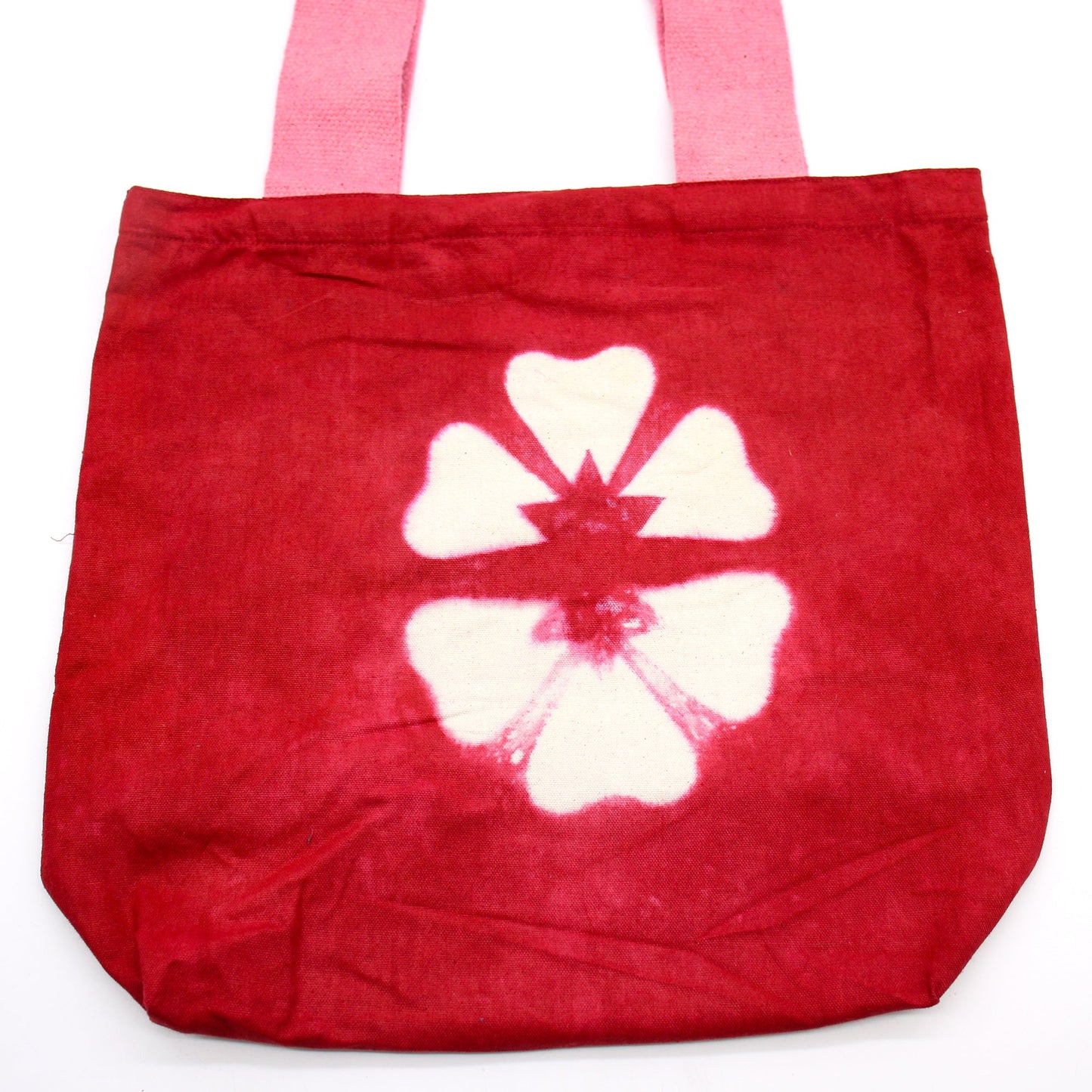 Natural Cotton Tie-Dyed Bag – Maroon Flower, Pink Handle with a central white flower and dark red centre by Quintessential Holistic Health Ltd