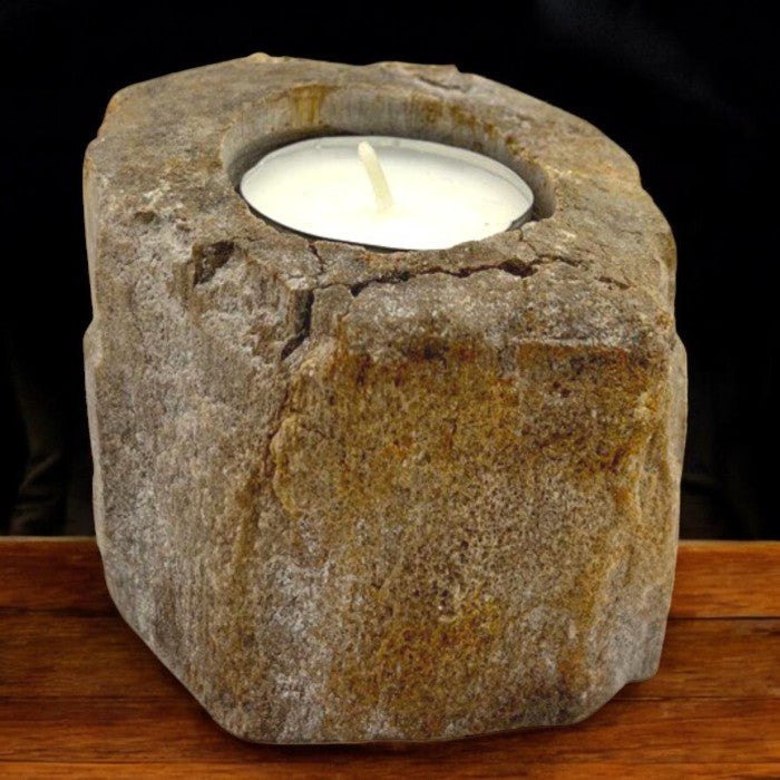 Hand-Carved Petrified Wood Tea-Light Holder - Single Low, rounded brown block with a mottled textured face and one circular recess, by Quintessential Holistic Health Ltd