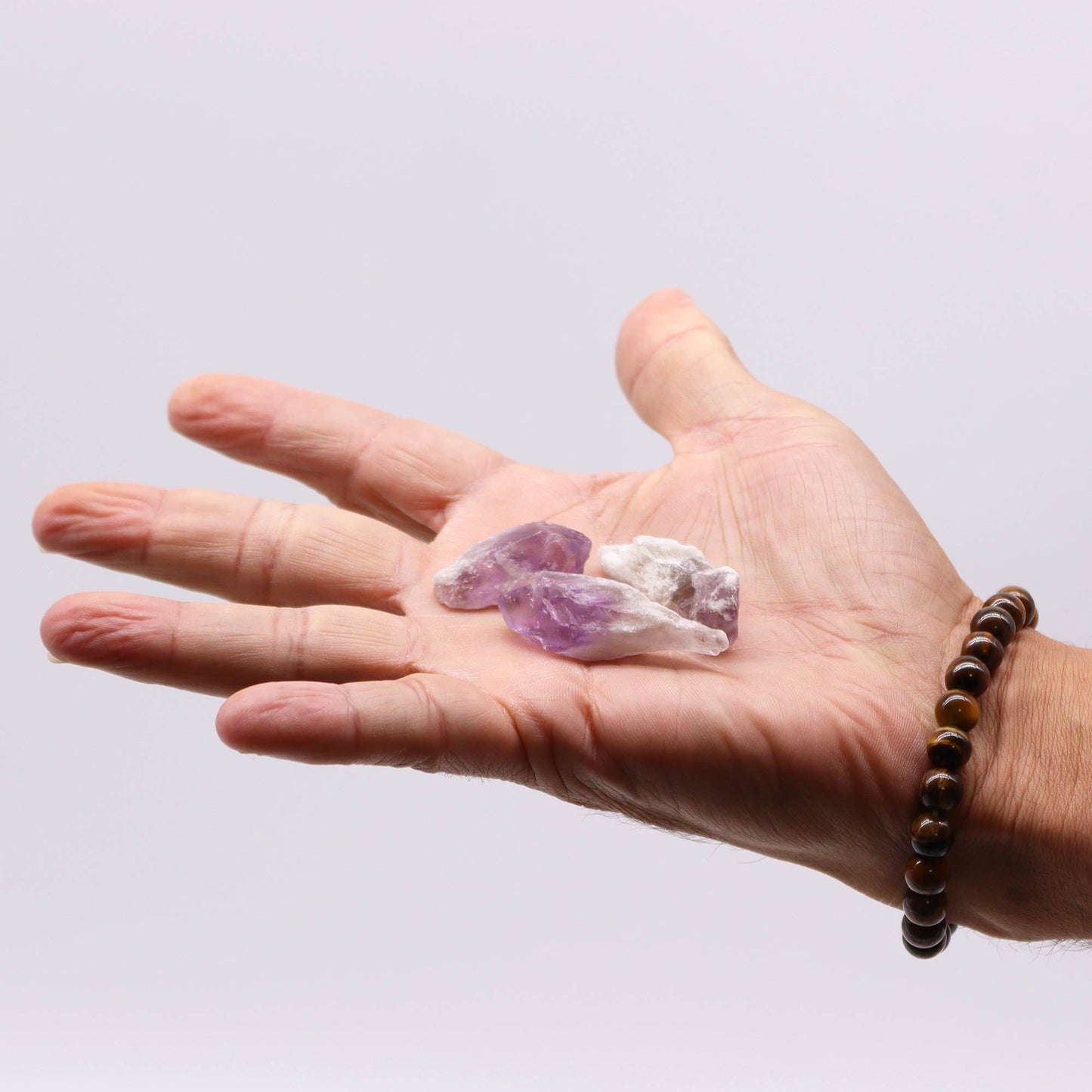 500g Raw Crystals - Amethyst Rough Points product packaging on clean background from Quintessential Holistic Health Ltd