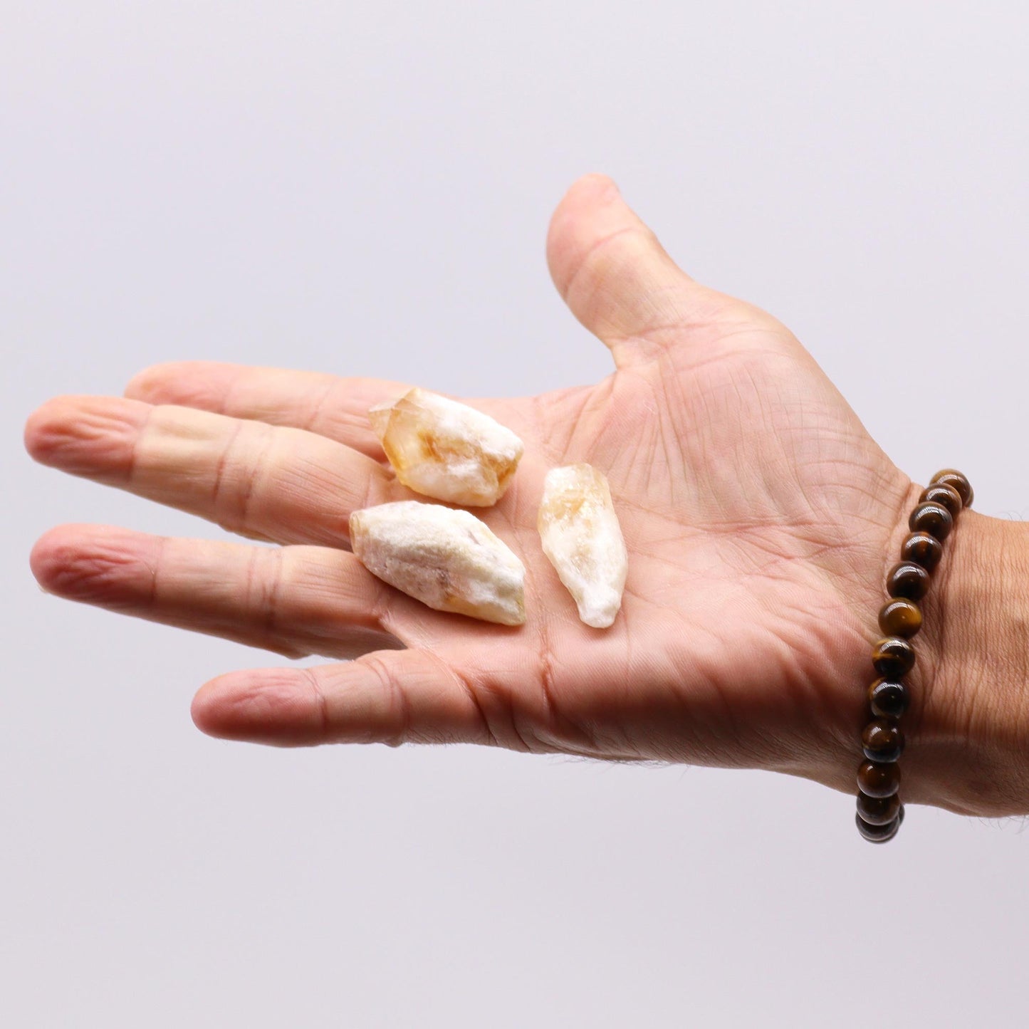 500g Raw Crystals - Citrine Rough Points product packaging on clean background from Quintessential Holistic Health Ltd