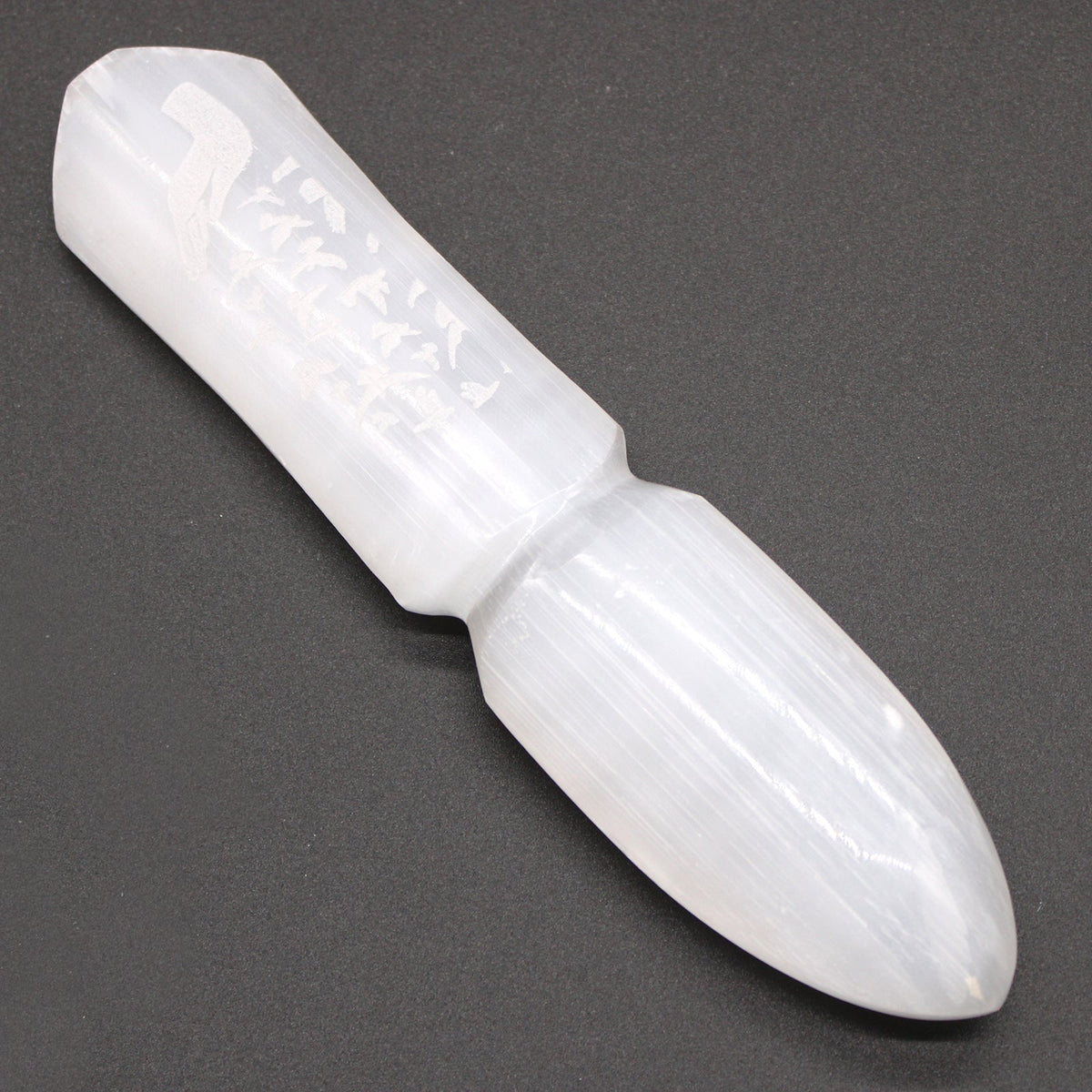 Handmade Selenite Ceremonial Knife - Releasing Bonds, pale knife with a rounded blade, bevelled grip and subtle carved pattern, by Quintessential Holistic Health Ltd