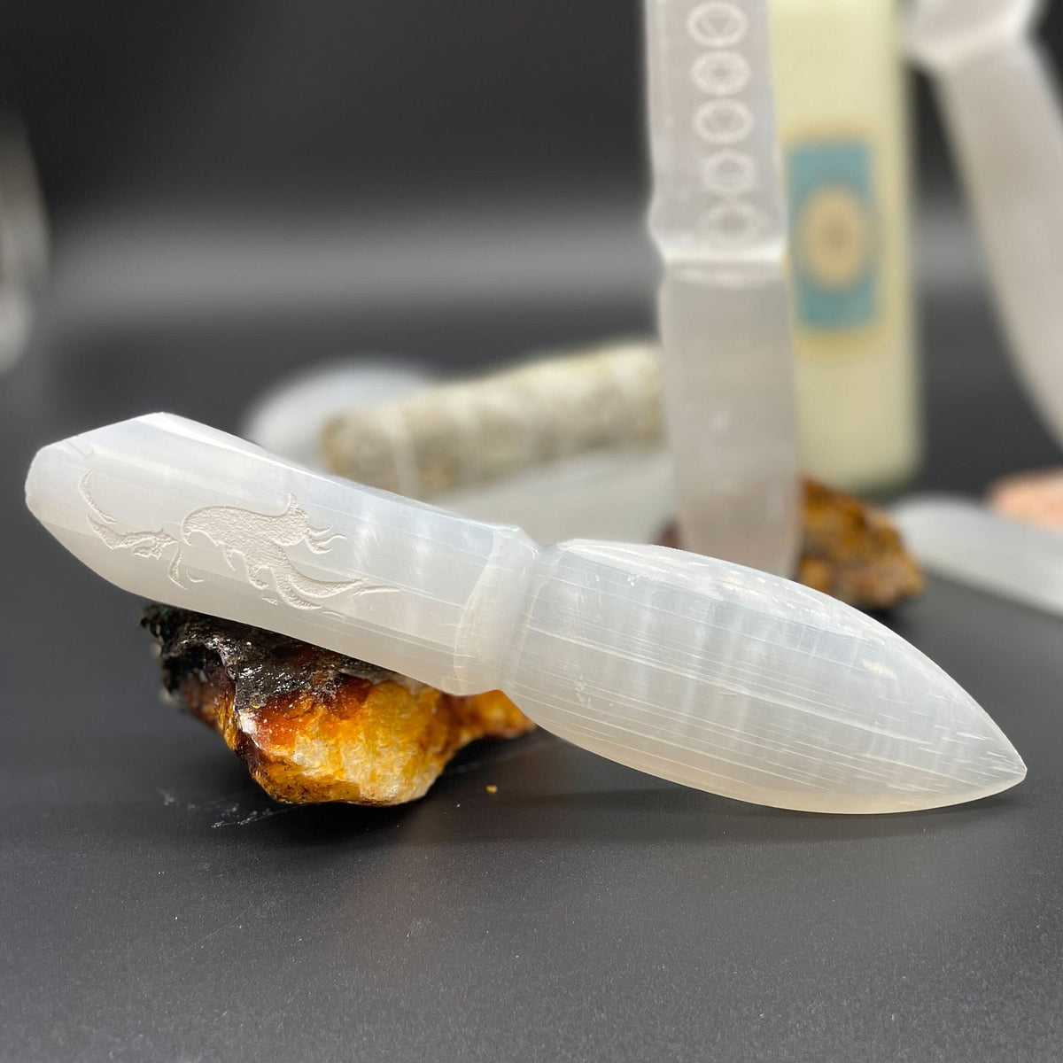 Handmade Selenite Ceremonial Knife - Letting Go of the Past, pale knife with a broad curved blade and engraved faceted grip, by Quintessential Holistic Health Ltd