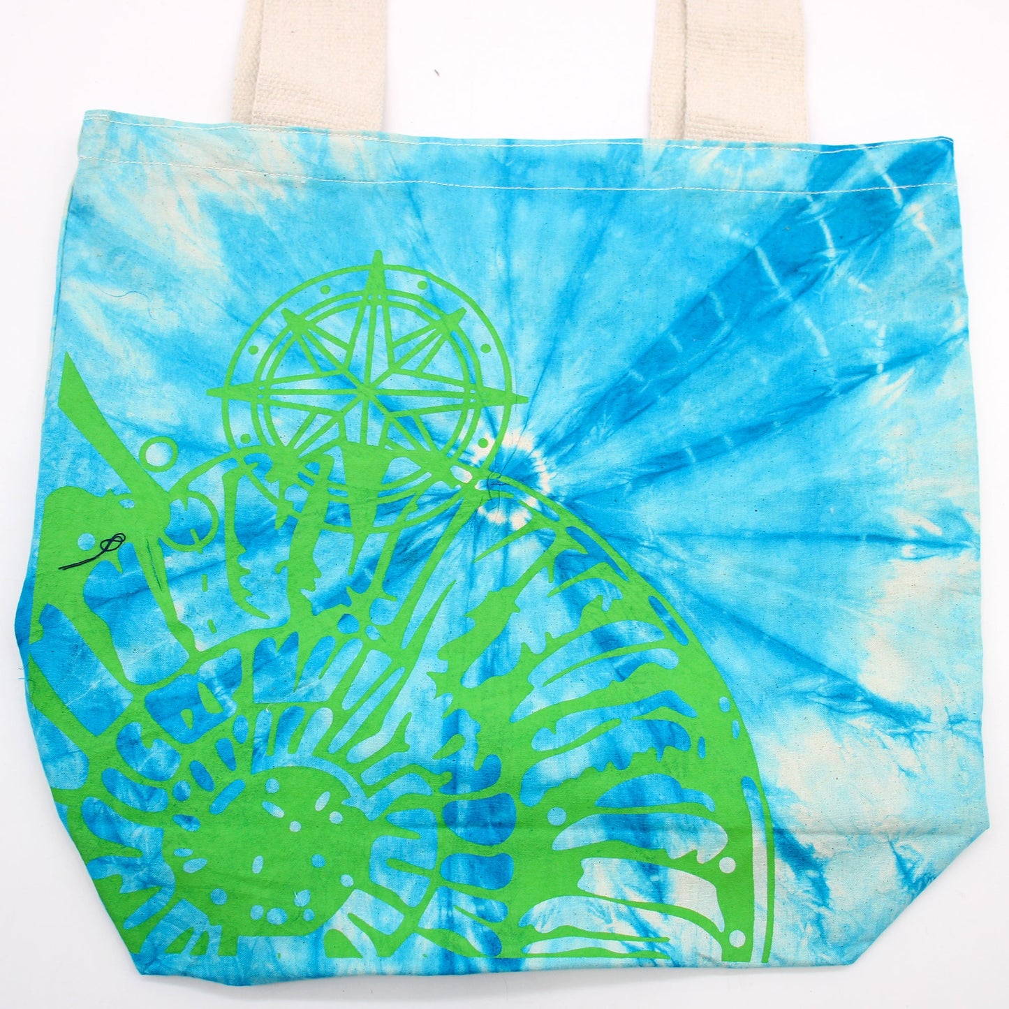 Tie-Dyed Cotton Tote Bag - Seashell - Blue and Green with layered green shell artwork across bright blue radial tie-dye by Quintessential Holistic Health Ltd