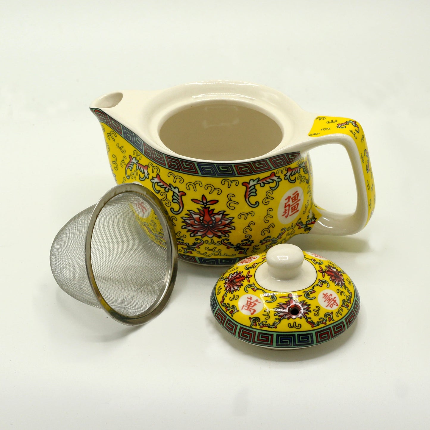 350ml Small Ceramic Long Life Yellow Oriental Design Herbal Teapot and Strainer product packaging on clean background from Quintessential Holistic Health Ltd