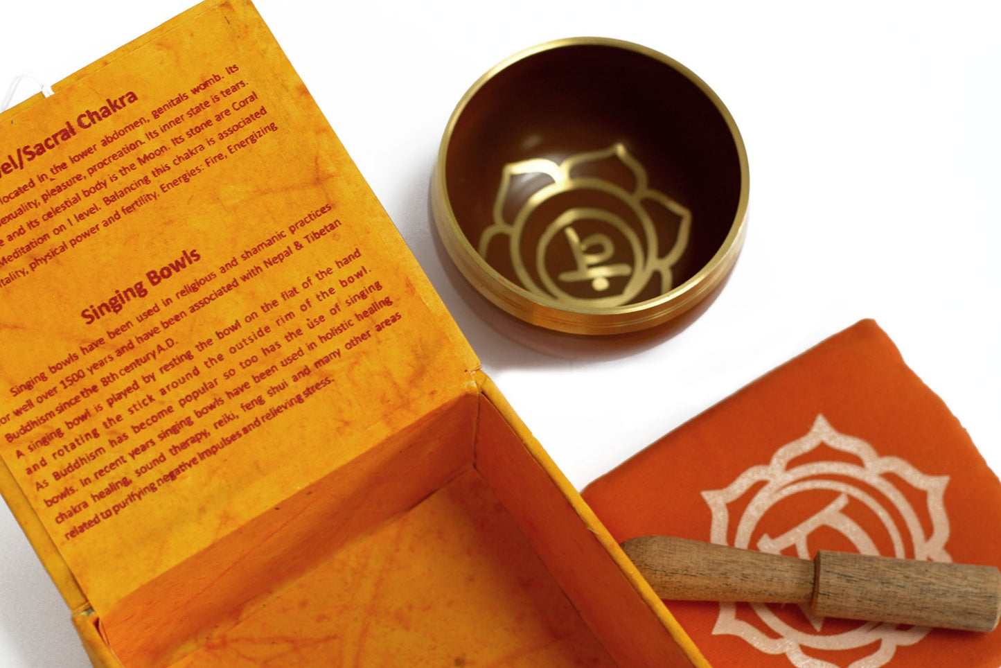 8cm Authentic Healing Chakra Brass Singing Bowl Set - Naval / Sacral Chakra product packaging on clean background from Quintessential Holistic Health Ltd