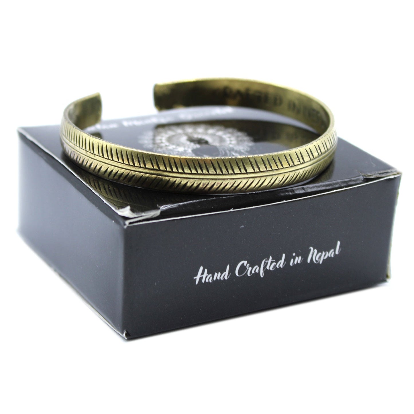Handcrafted Brass Tibetan Bracelet - Slim Tribal Leaf product packaging on clean background from Quintessential Holistic Health Ltd