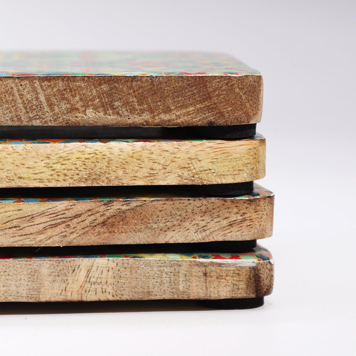 Mango Wood Coasters, Set of 4 - Mediterranean Green, close-up side view of four stacked coaster edges, by Quintessential Holistic Health Ltd
