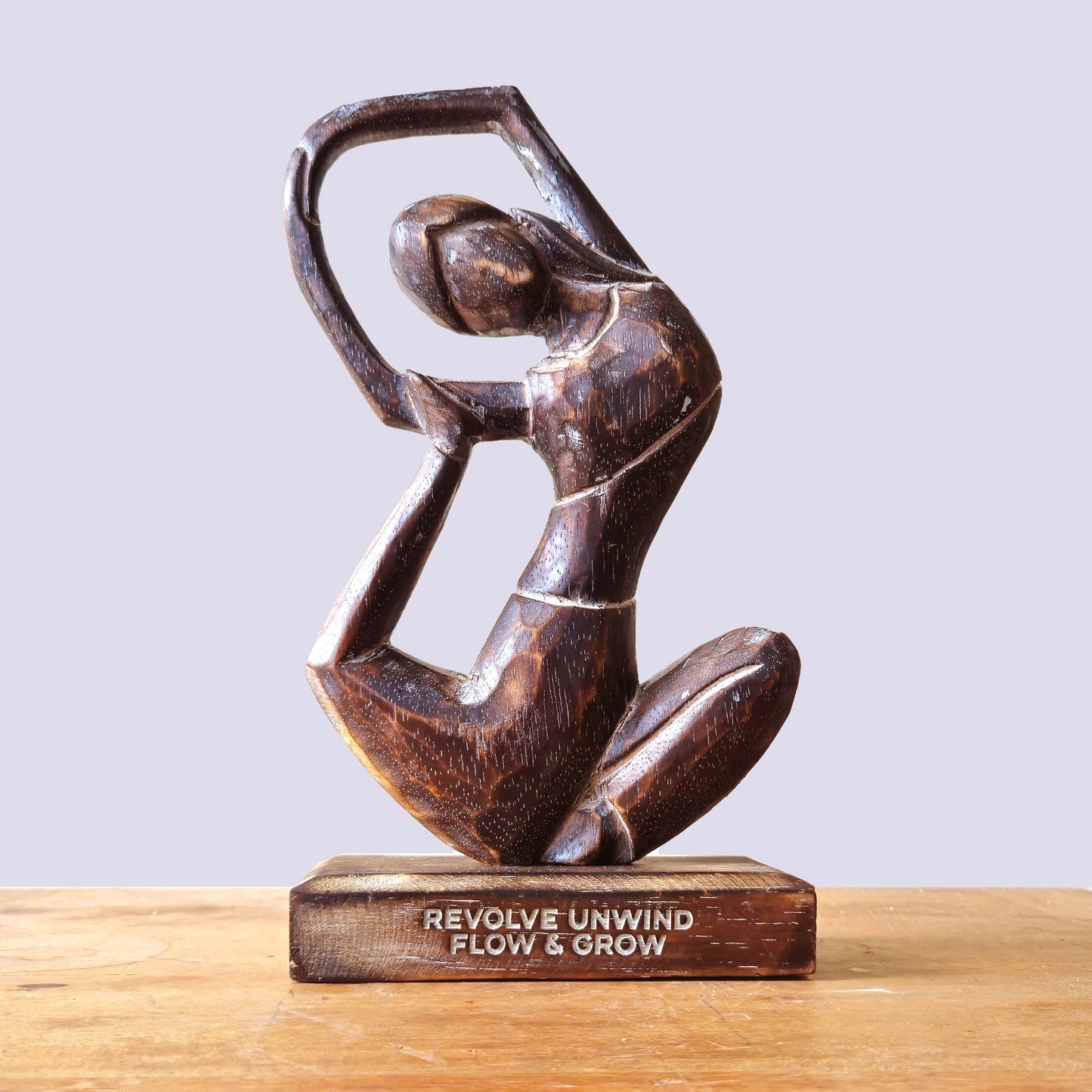 Handmade Eco-Friendly Albasia Wood Yoga Lady - Revolved Pose / Revolve Unwind / Flow & Grow - Antique Brown product packaging on clean background from Quintessential Holistic Health Ltd