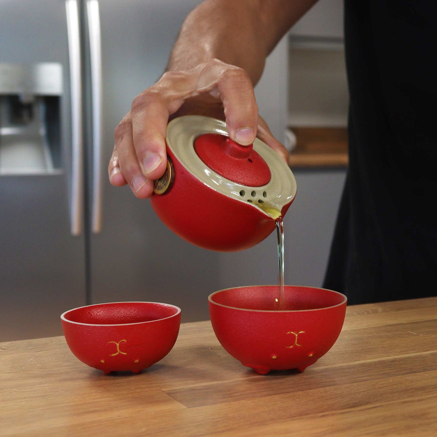 200ml Red Money Cat Ceramic Teapot Poring tea into a Matching Cup