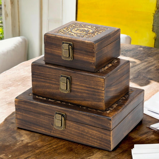 Set of Mango Wood Vintage Style Carved Tea Box with 4 6 and 12 Compartments on top of a Table