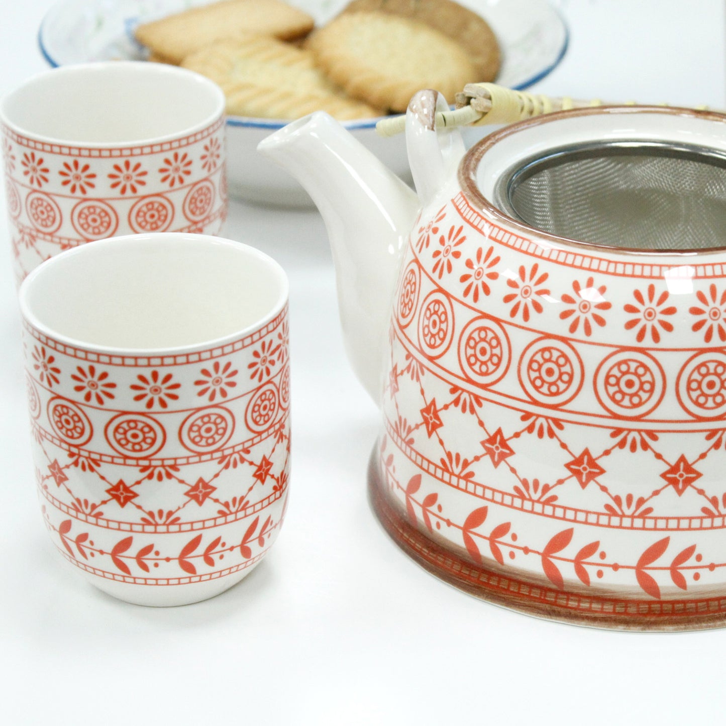 Side View of the 650ml Amber Design White Glazed Herbal Teapot with Strainer and a 6 Matching Cup Set