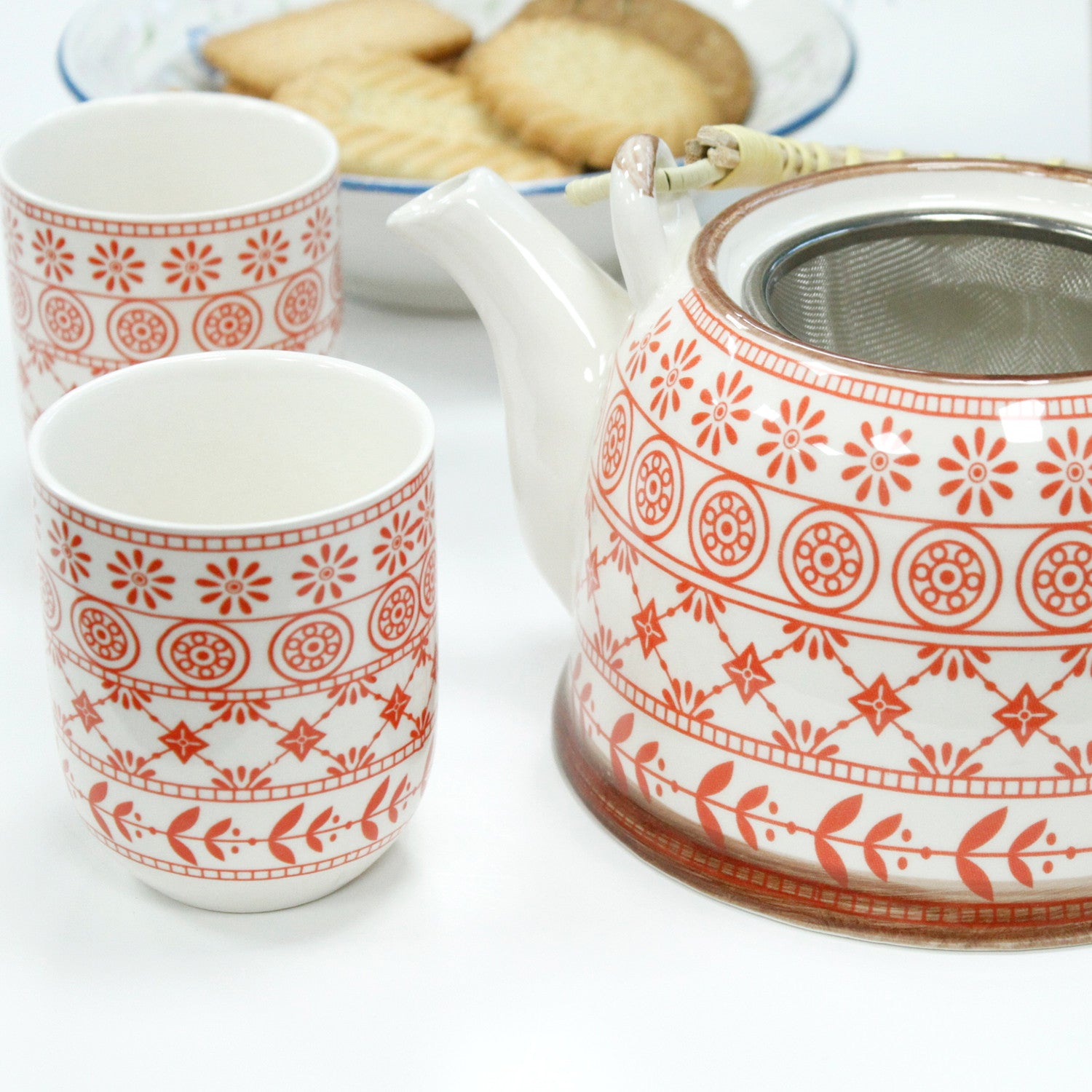 Side View of the 650ml Amber Design White Glazed Herbal Teapot with Strainer and a 6 Matching Cup Set
