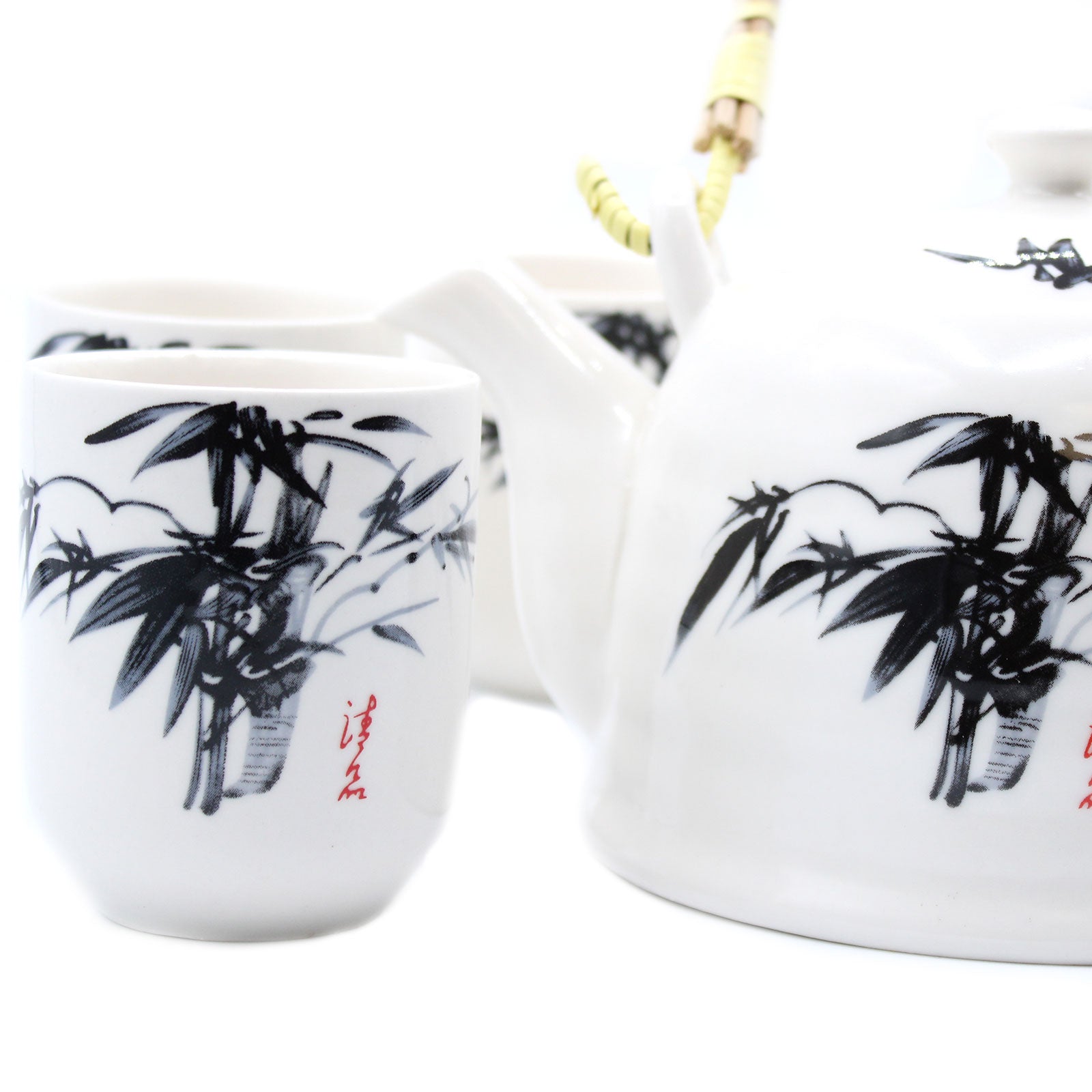 Zoomed In on the 650ml Oriental Black Bamboo Design White Ceramic Teapot with a Strainer and a 6 Matching Cup Set