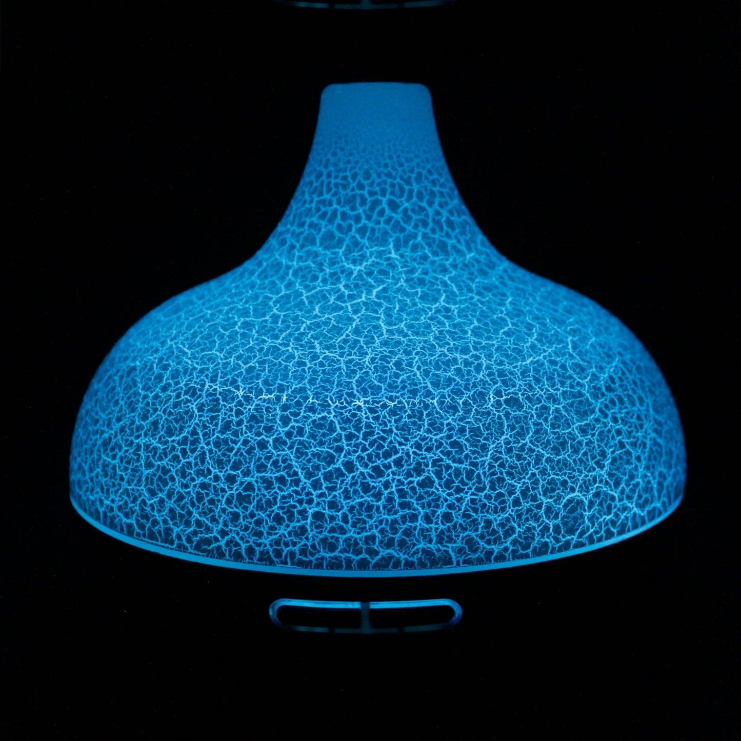USB Aroma Diffuser - Santorini Shell glowing turquoise through a crackle-patterned dome by Quintessential Holistic Health Ltd
