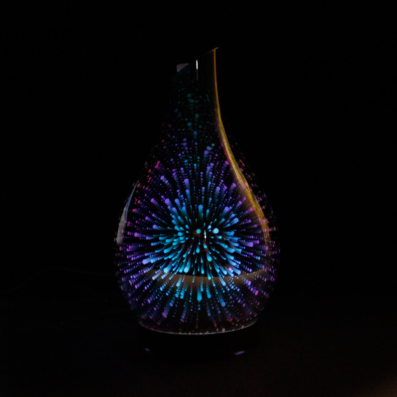 Colour-Changing USB Aroma Diffuser - Ibiza glowing blue and purple with a firework-like light pattern by Quintessential Holistic Health Ltd