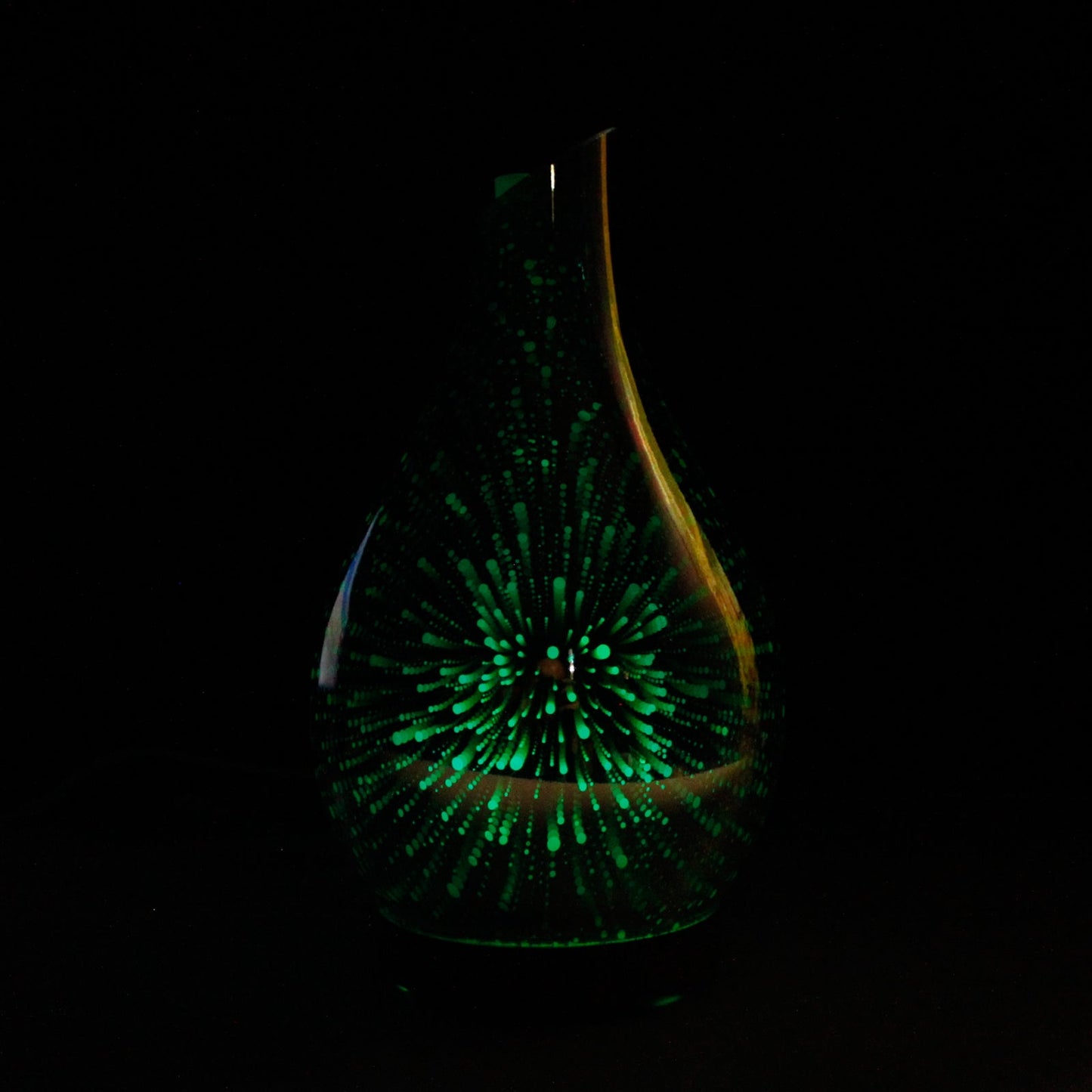 Colour-Changing USB Aroma Diffuser - Ibiza glowing green with a firework-like light pattern on its teardrop body by Quintessential Holistic Health Ltd
