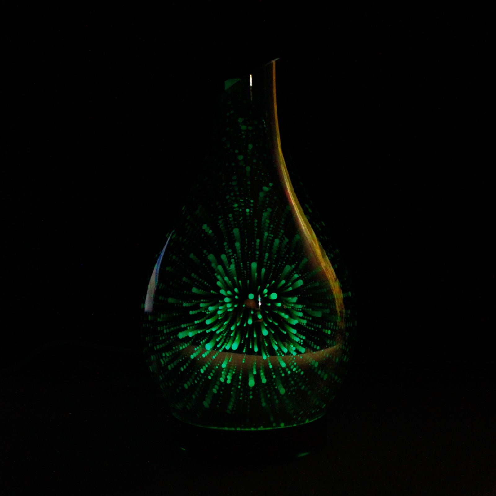 Colour-Changing USB Aroma Diffuser - Ibiza glowing green with a firework-like light pattern on its teardrop body by Quintessential Holistic Health Ltd