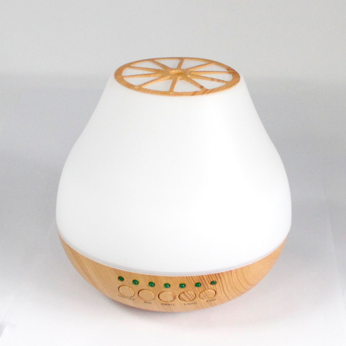 Colour-Changing USB Bluetooth Speaker Aroma Diffuser - Viennese with a white tapered body, wood-effect base and citrus-slice top detail by Quintessential Holistic Health Ltd