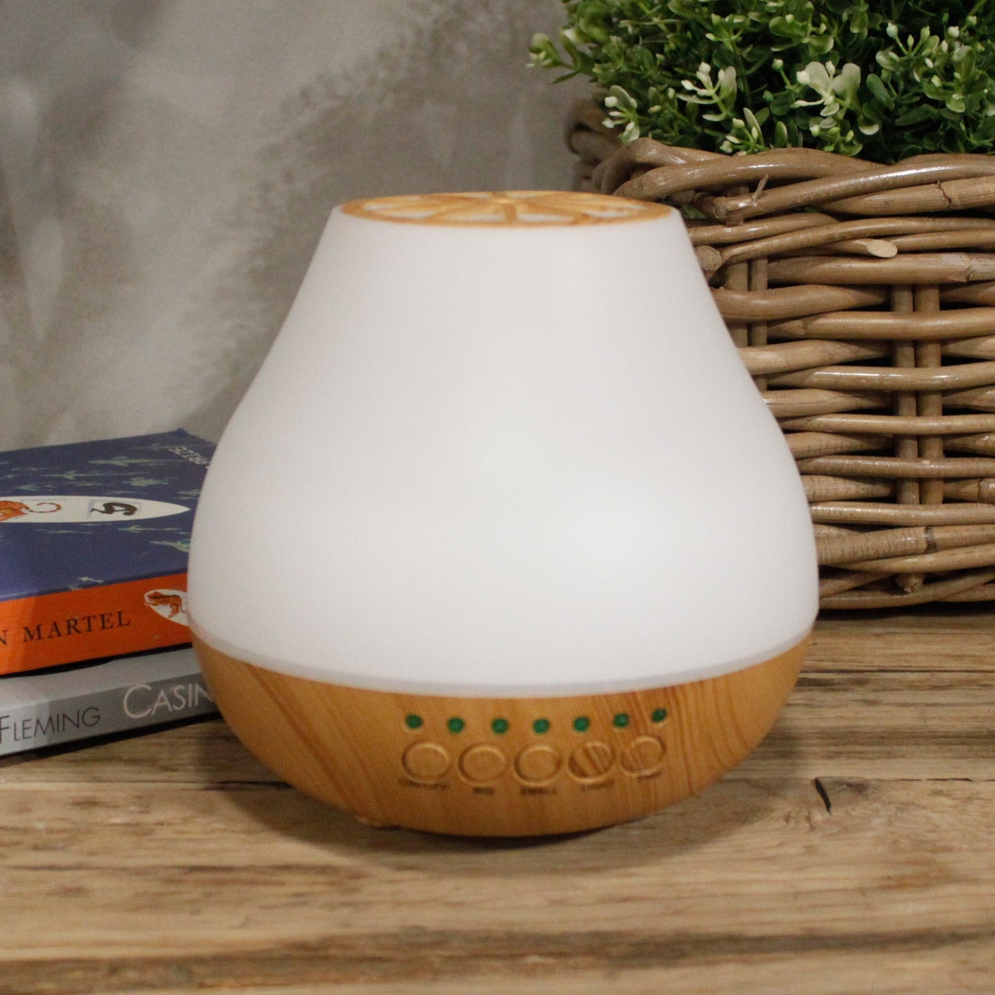 Colour-Changing USB Bluetooth Speaker Aroma Diffuser - Viennese with a white tapered body, wood-effect base and green indicator lights by Quintessential Holistic Health Ltd