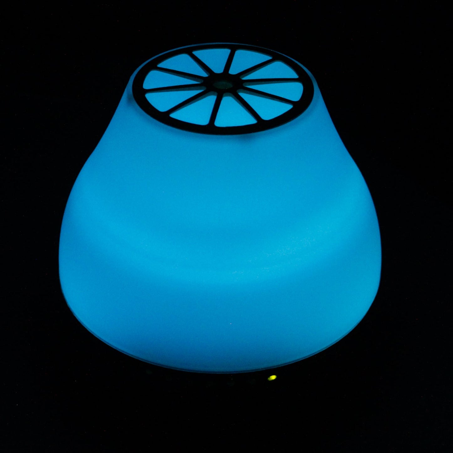 Colour-Changing USB Bluetooth Speaker Aroma Diffuser - Viennese glowing blue with a black citrus-slice top detail by Quintessential Holistic Health Ltd