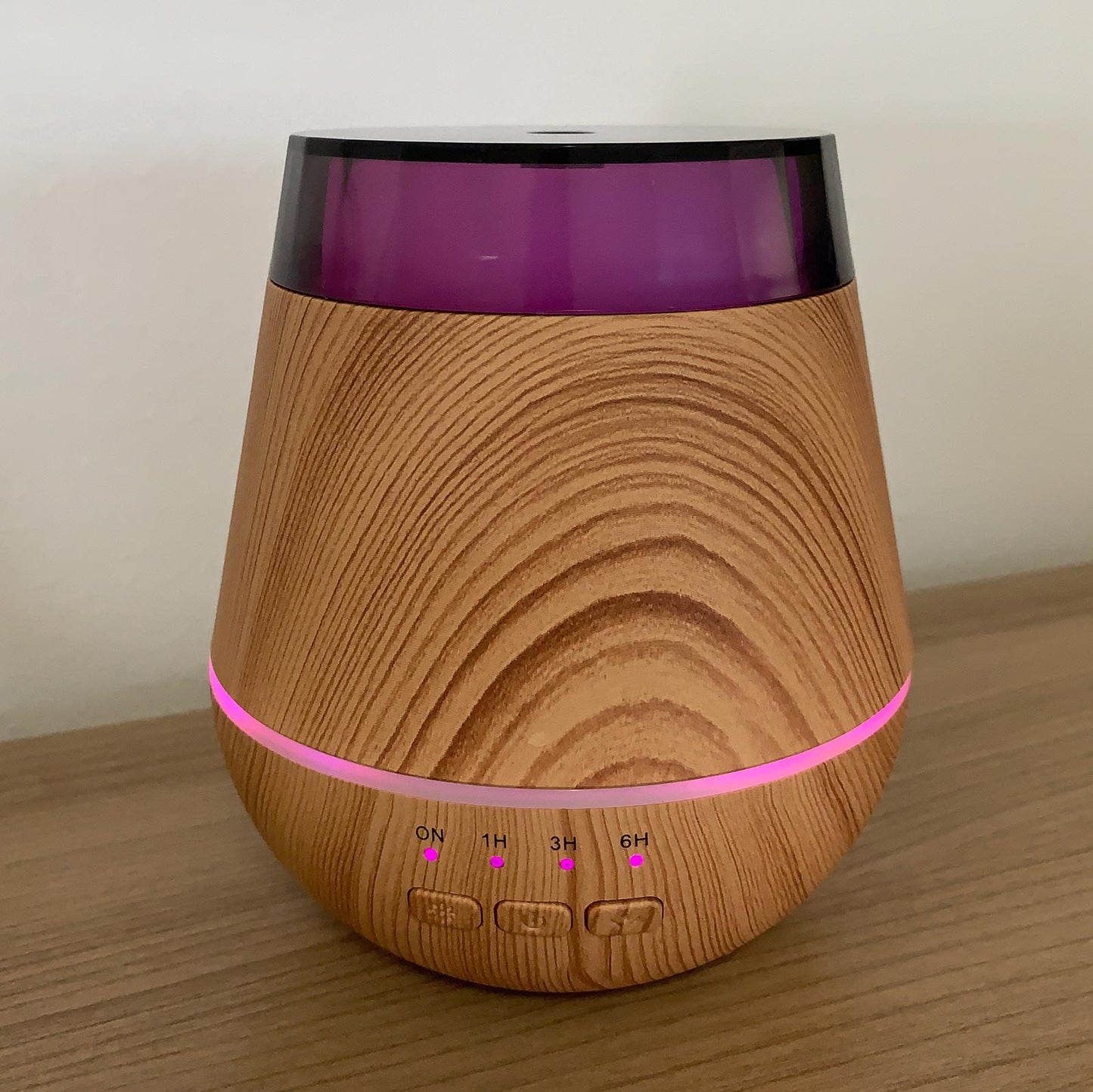 Colour-Changing USB Aroma Diffuser - Helsinki, wood-grain diffuser illuminated with pink and purple light by Quintessential Holistic Health Ltd